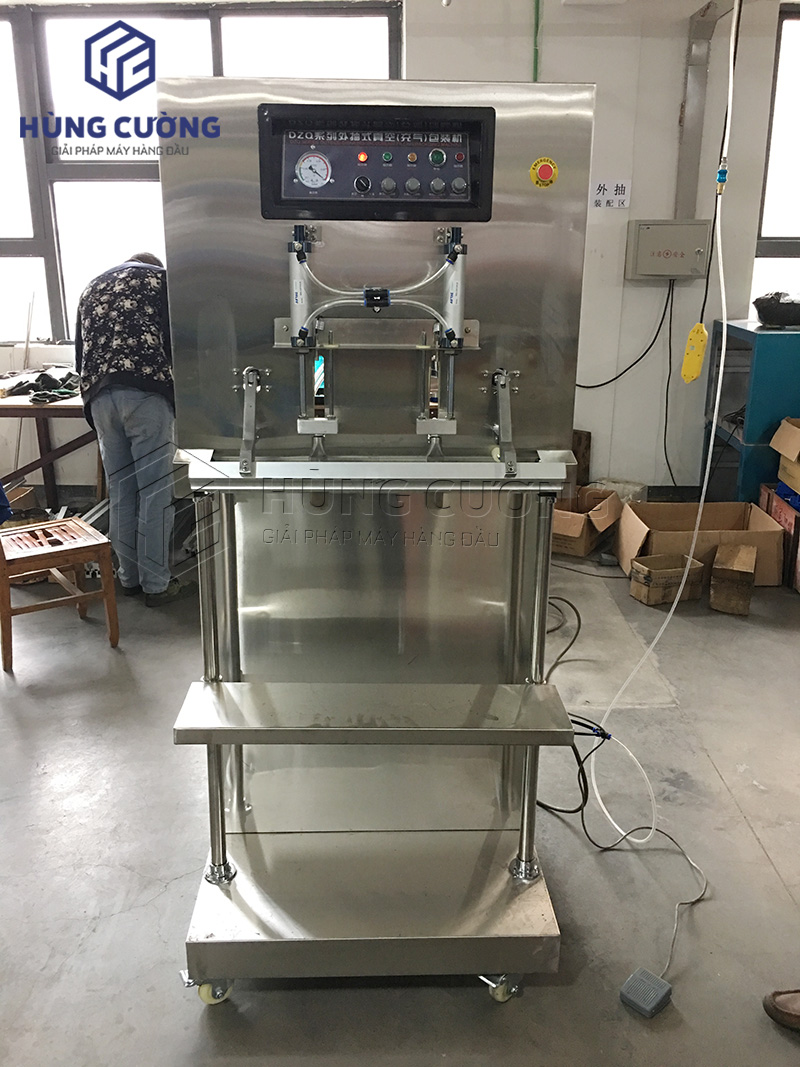 May-dong-goi-hut-chan-khong-truc-dung-dzq-700f (1)