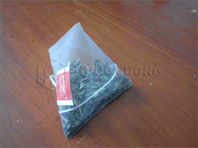 4. May-dong-goi-tra-tui-tam-giac-DXDC50B