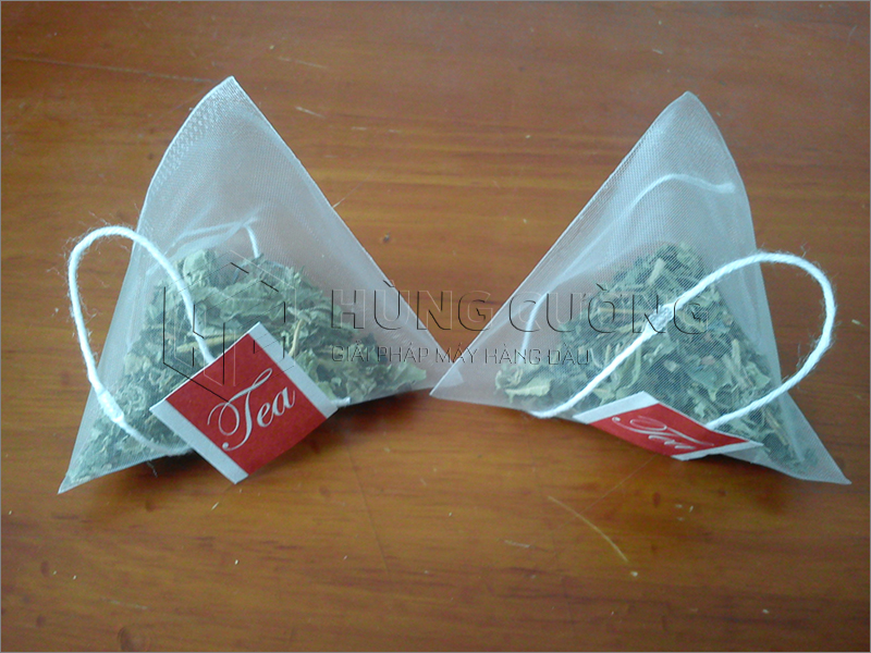 6. May-dong-goi-tra-tui-tam-giac-DXDC50B