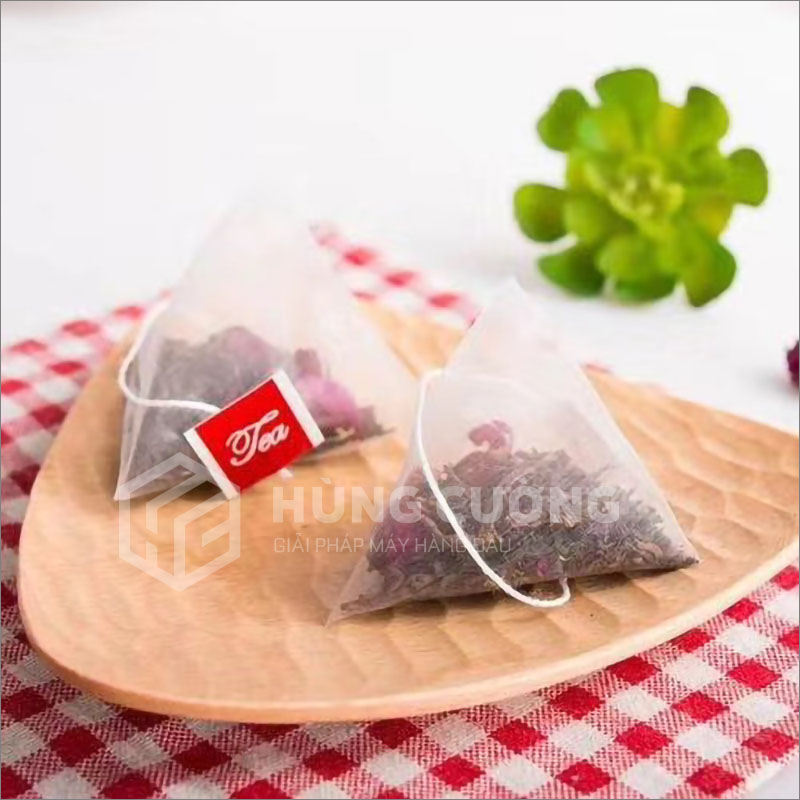 6. May-dong-goi-tra-tui-tam-giac-sjb-06