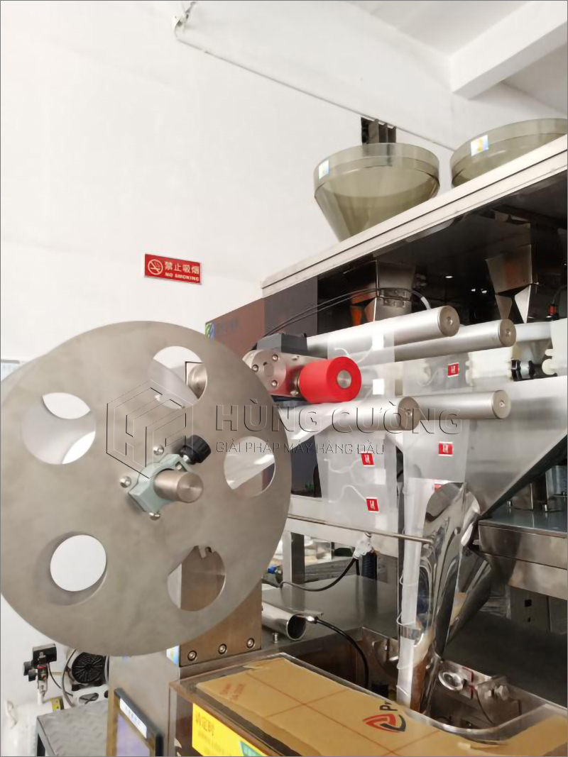 8. May-dong-goi-tra-tui-tam-giac-sjb-04