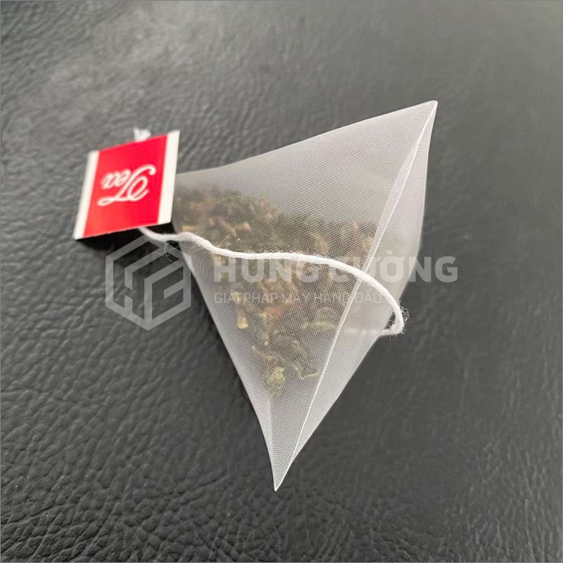 4. To-hop-may-dong-goi-tra-tui-tam-giac-dxdc50b-can-dinh-luong